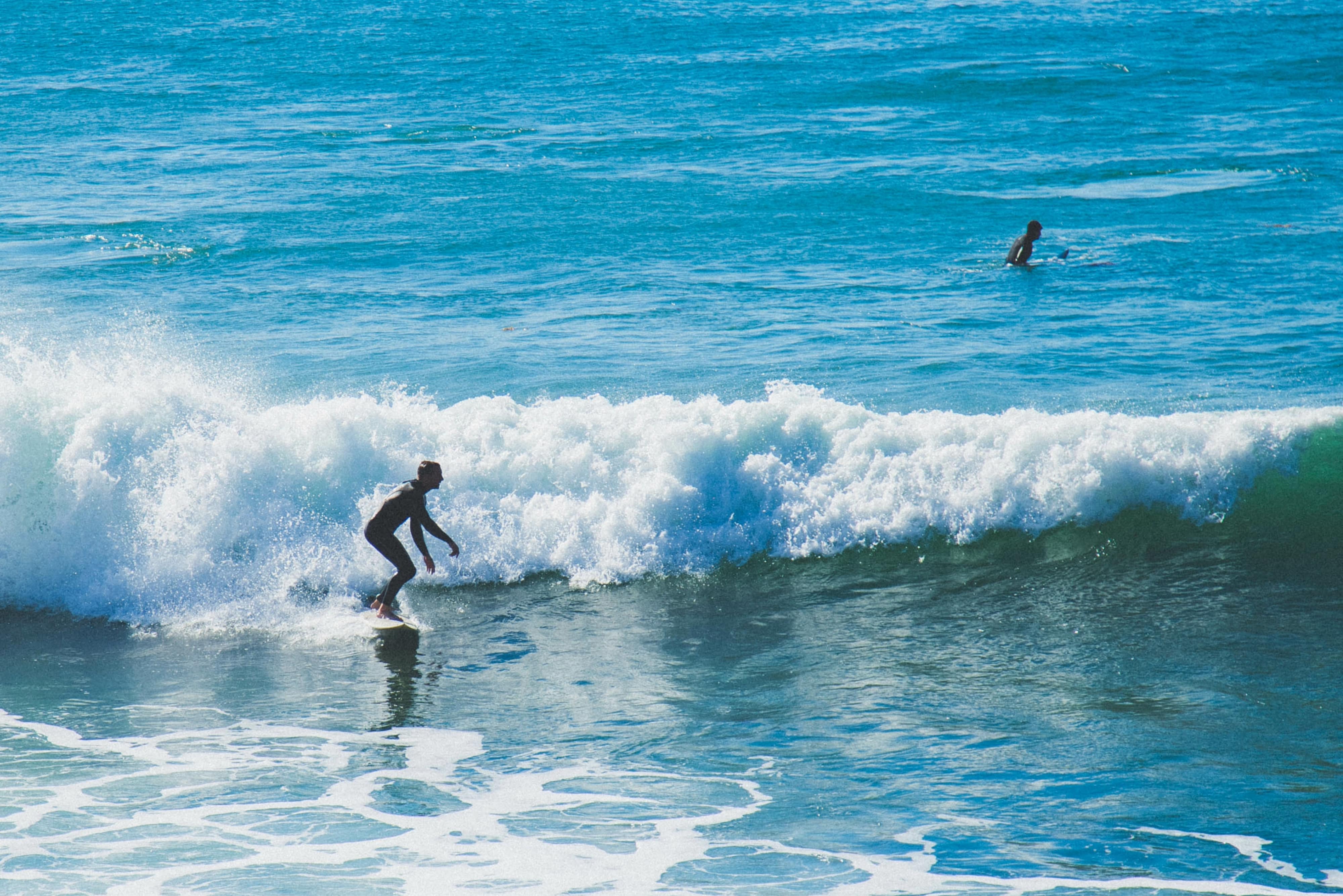 Surfer in action in Laguna beach in southern California in January heisler park