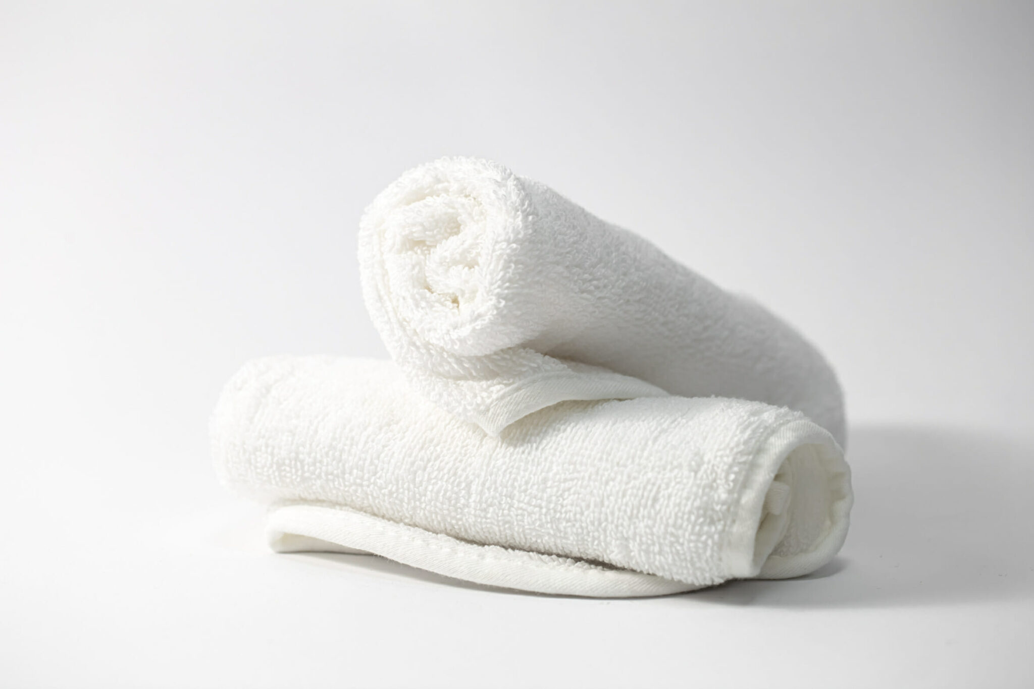 White face towels on a white background isolated