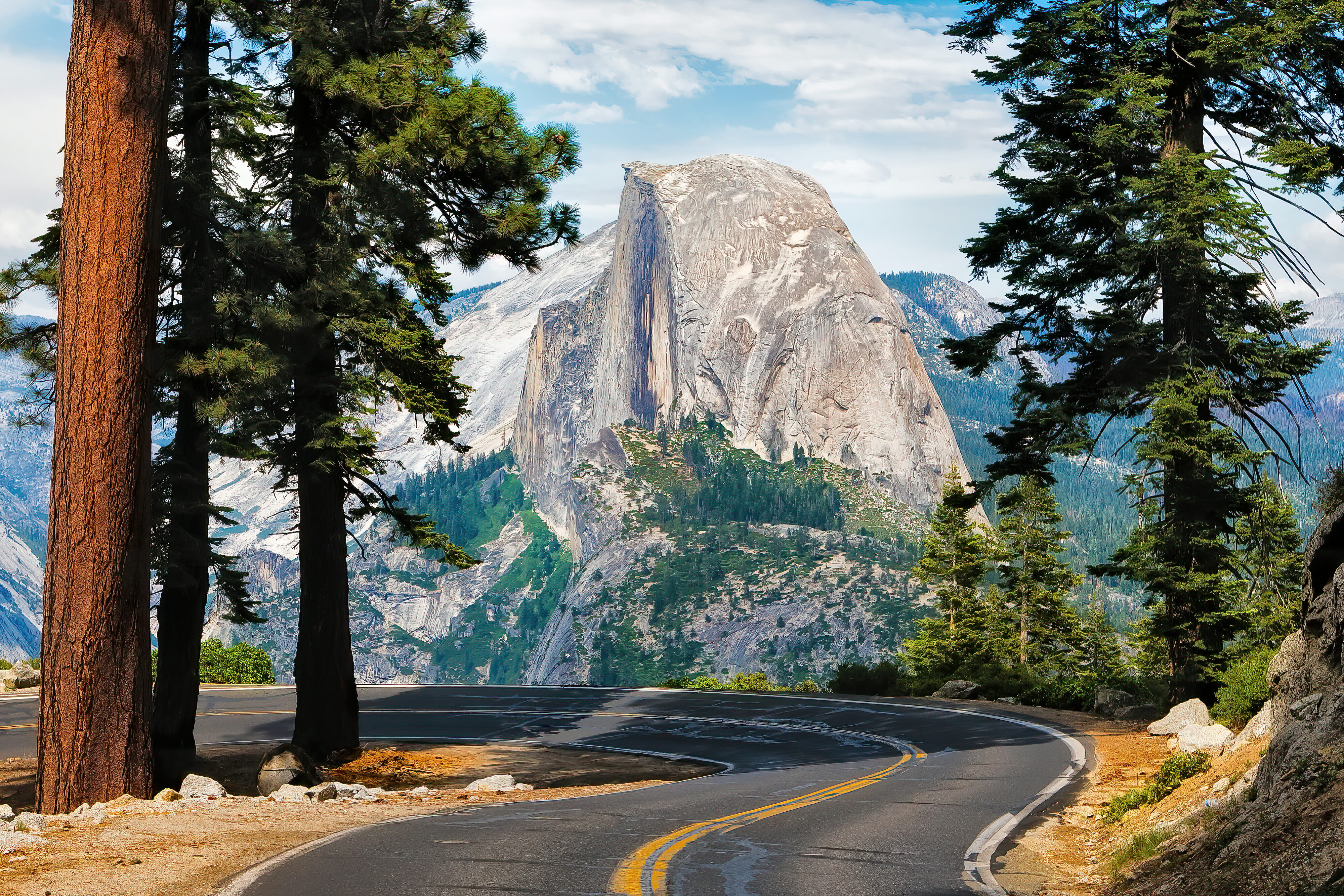 The road leading to Glacier Point in Yosemite National Park, California, USA with the Half Dome in the background