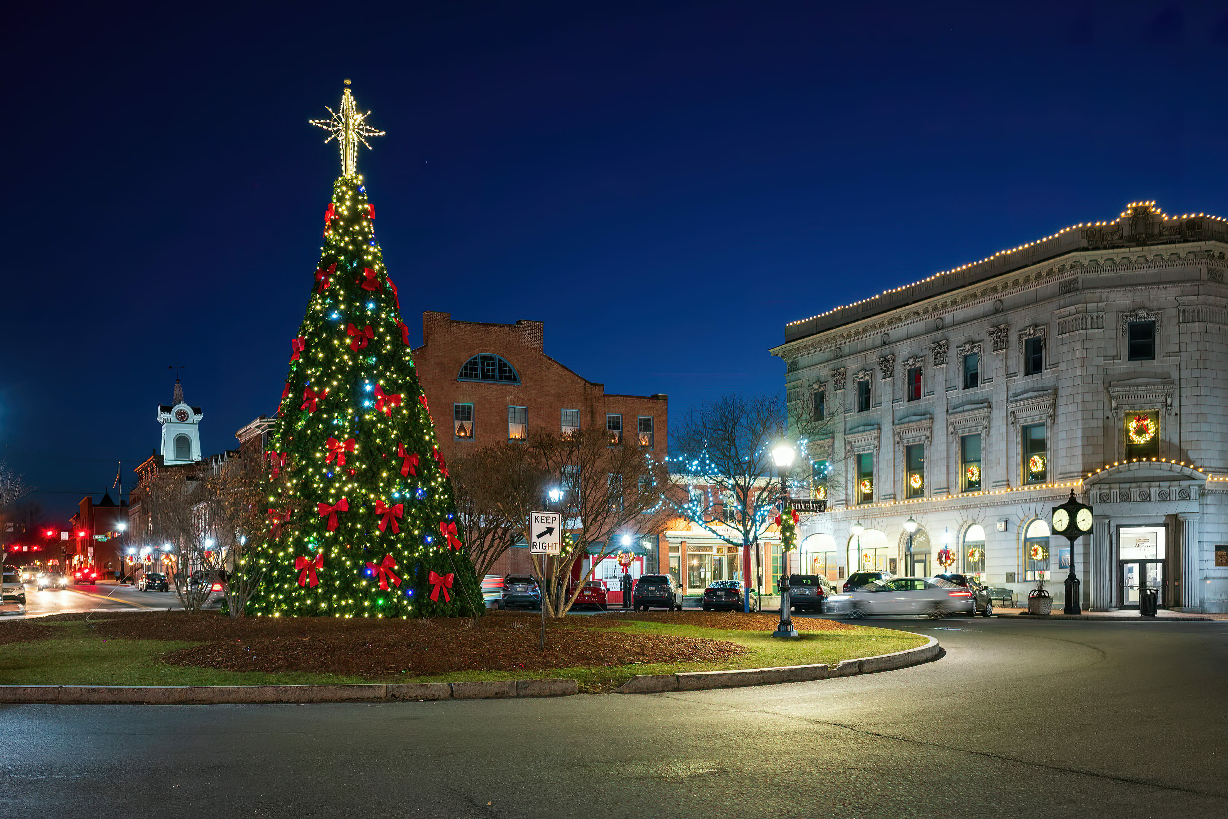 Historic town square with holiday tree lit up at night at Christmas, Gettysburg, Pennsylvania