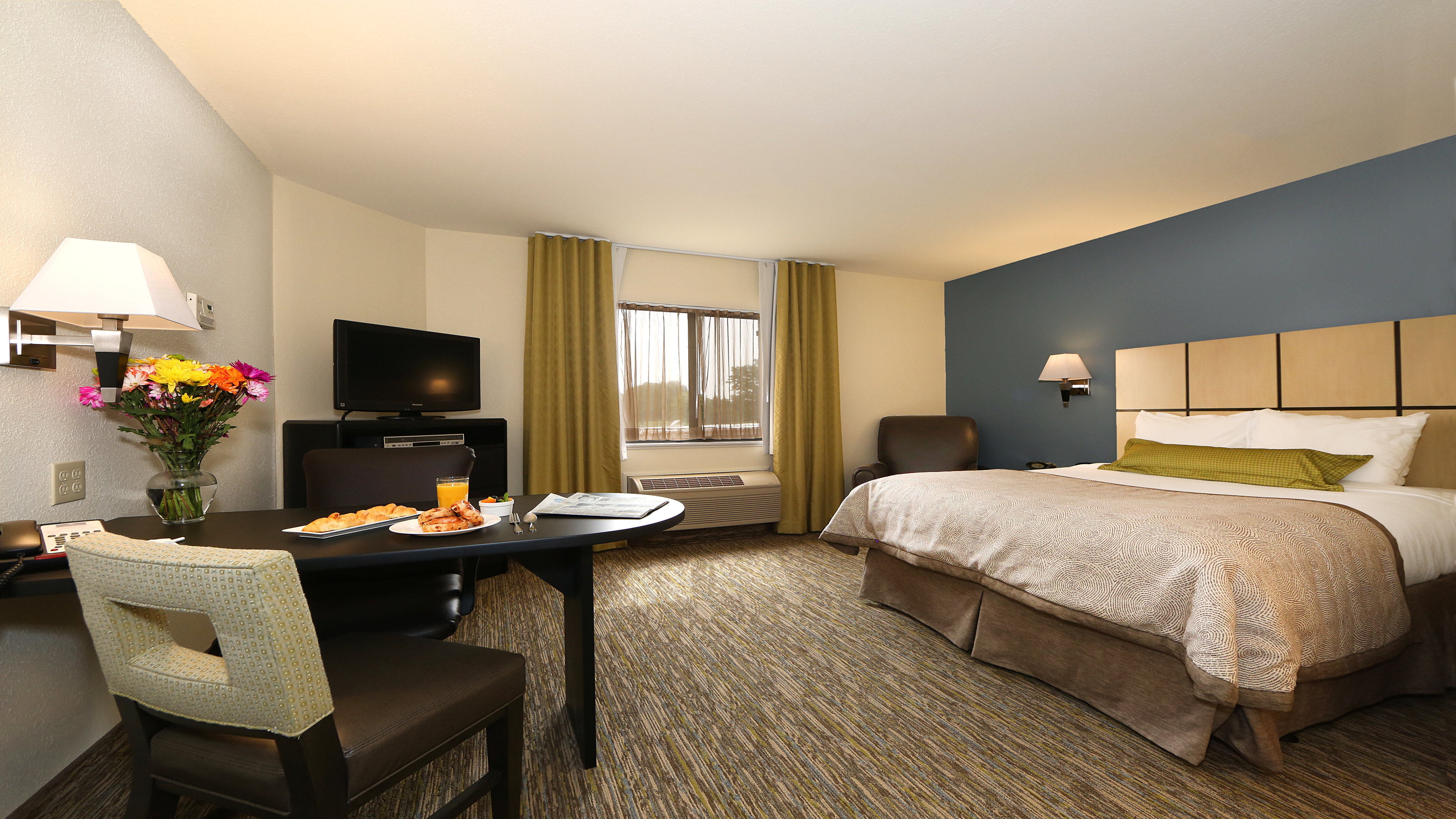 Bedroom view of Candlewood Suites East Lansing, an IHG Hotel
